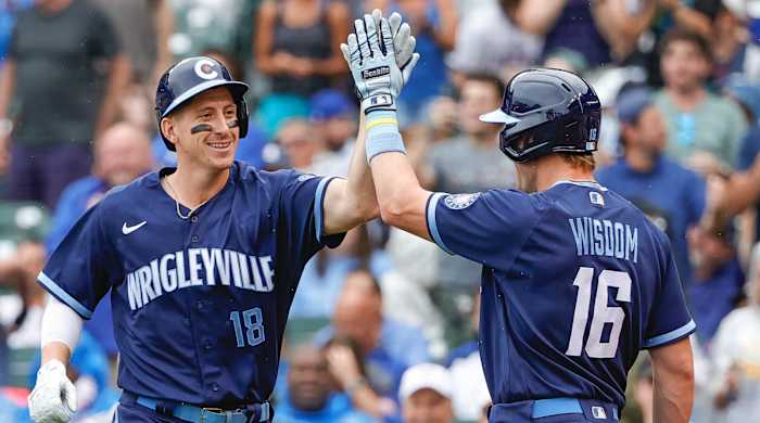 Sep. 3 2021 - Chicago Cubs first baseman Frank Schwindel (18) celebrates with third baseman Patrick Wisdom (16) after hitting a solo home run